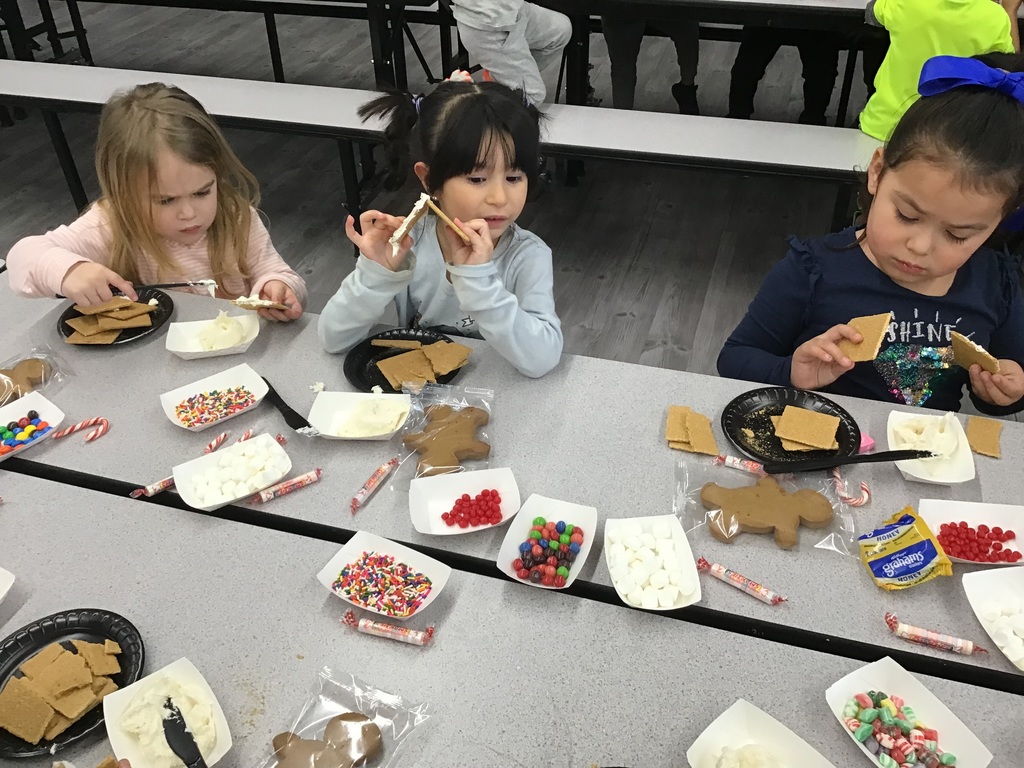 pre-k builds gingerbread houses